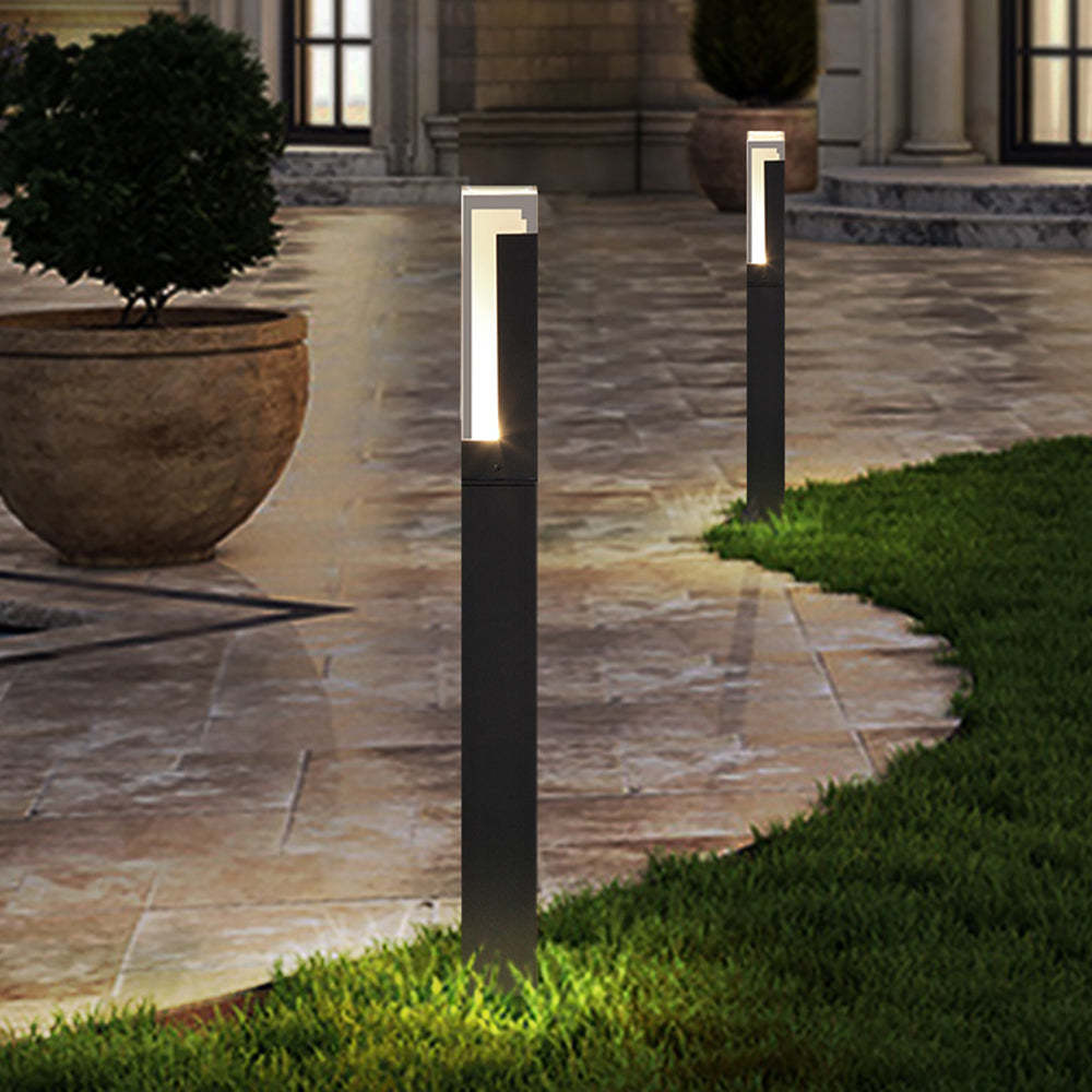 Modern outdoor path lights illuminating garden