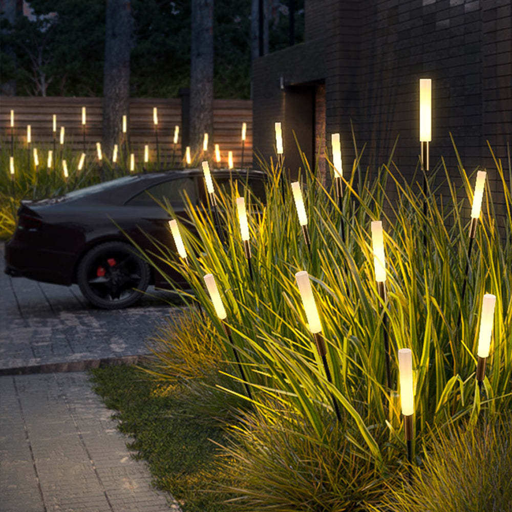 Pena Solar Outdoor Post Lights illuminating garden at night