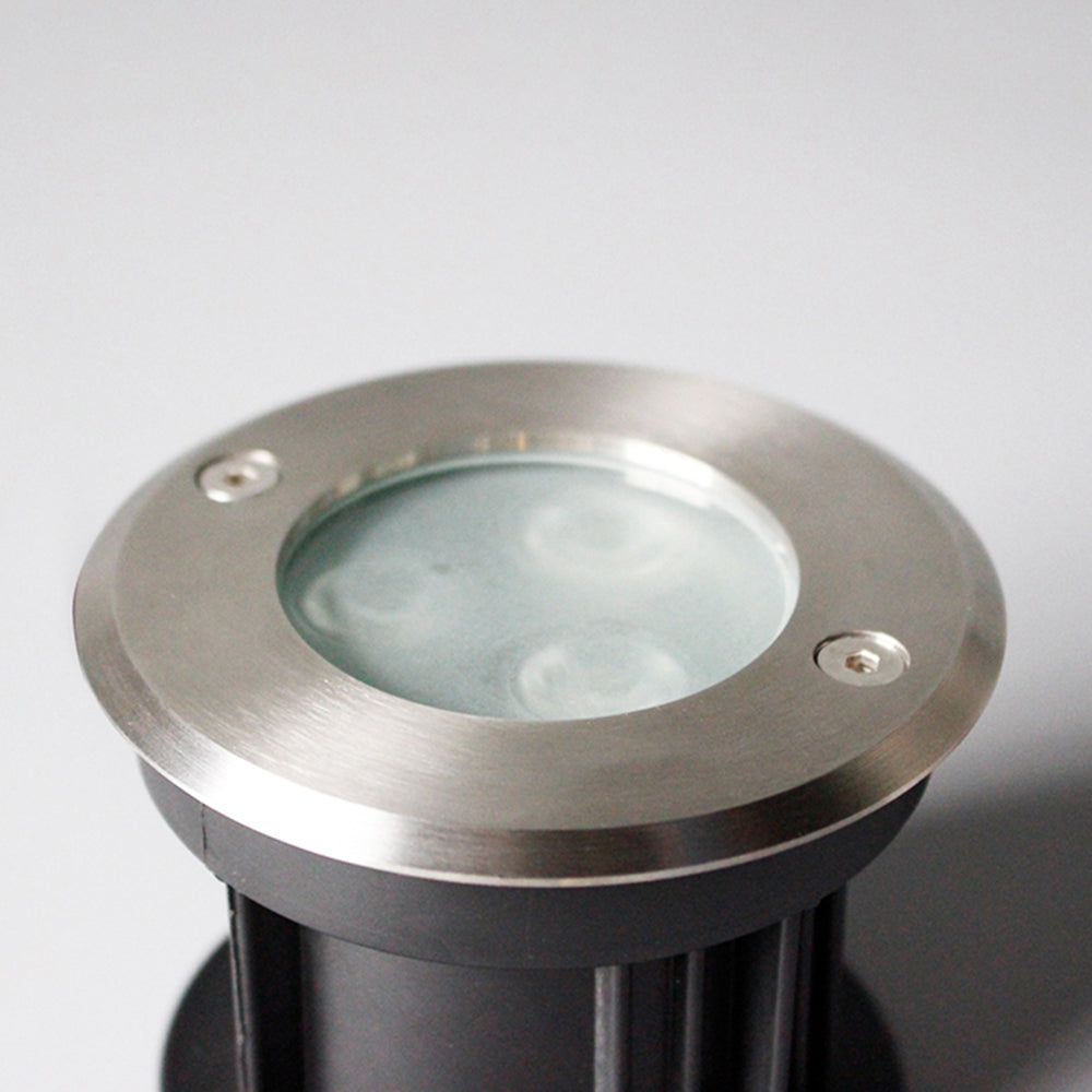 Pena metal recessed outdoor step light close-up.
