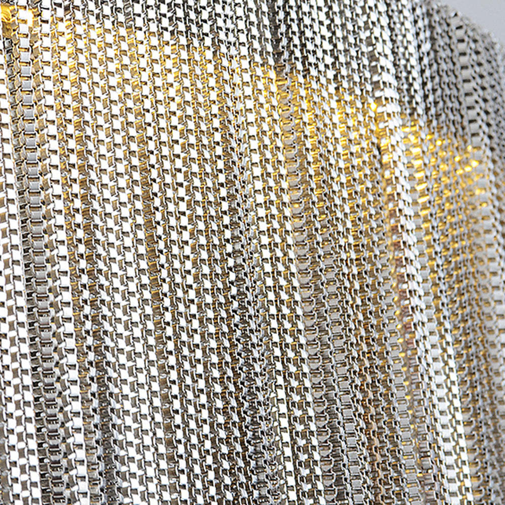 Close-up silver chain tassel pendant light detail