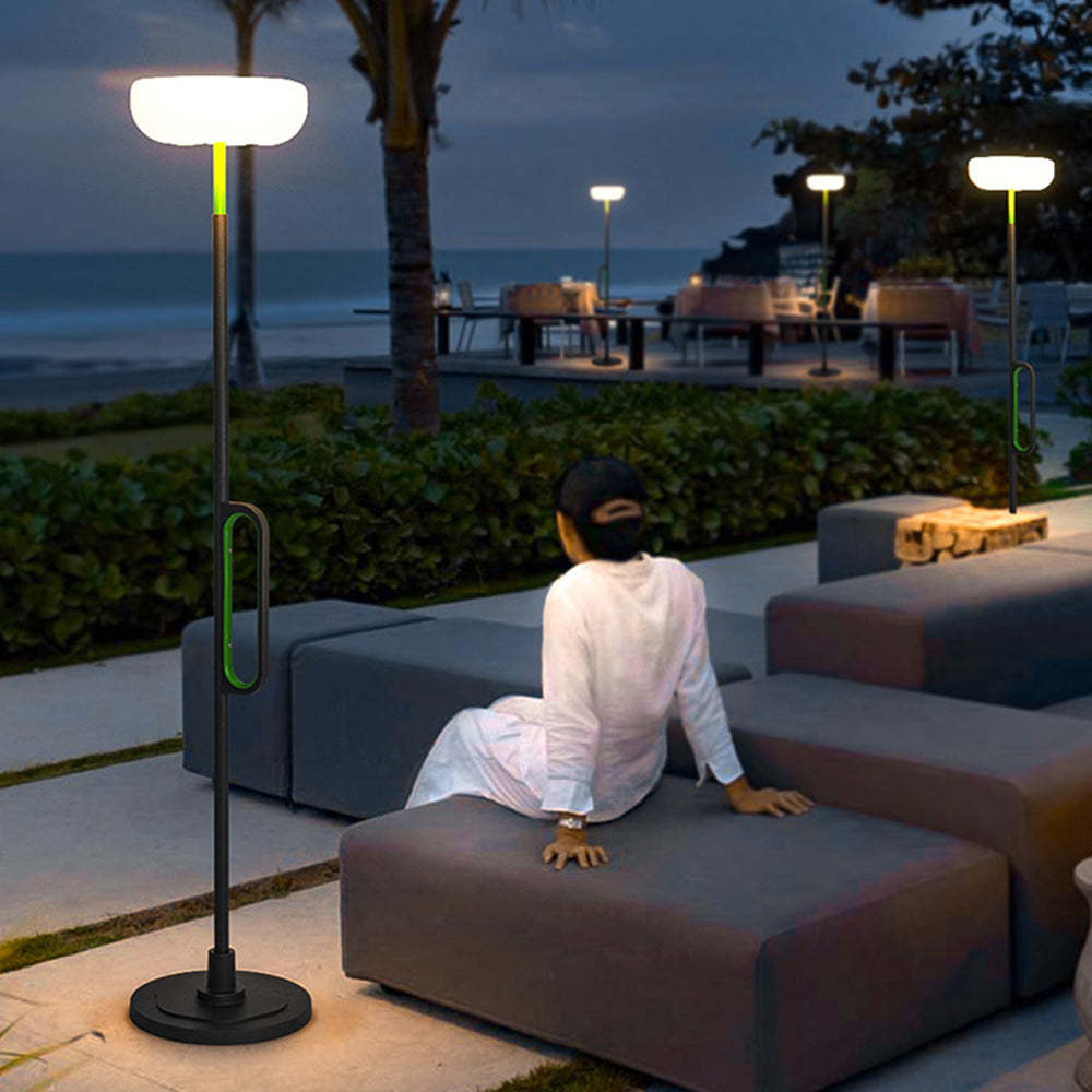 Orr solar floor lamp at dusk, minimalist outdoor lighting