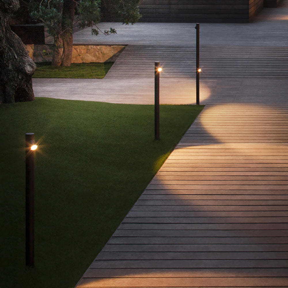 Edge Outdoor Floor Lamps on garden path.