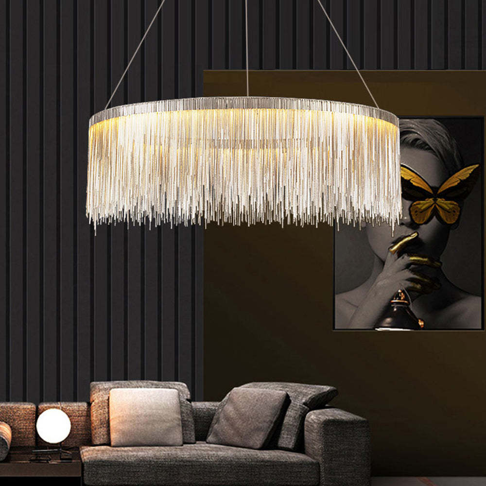 Art Deco pendant light over a living room sofa