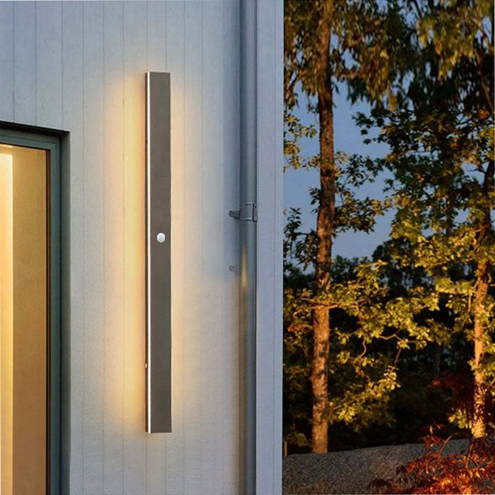 Edge outdoor wall light illuminating home exterior