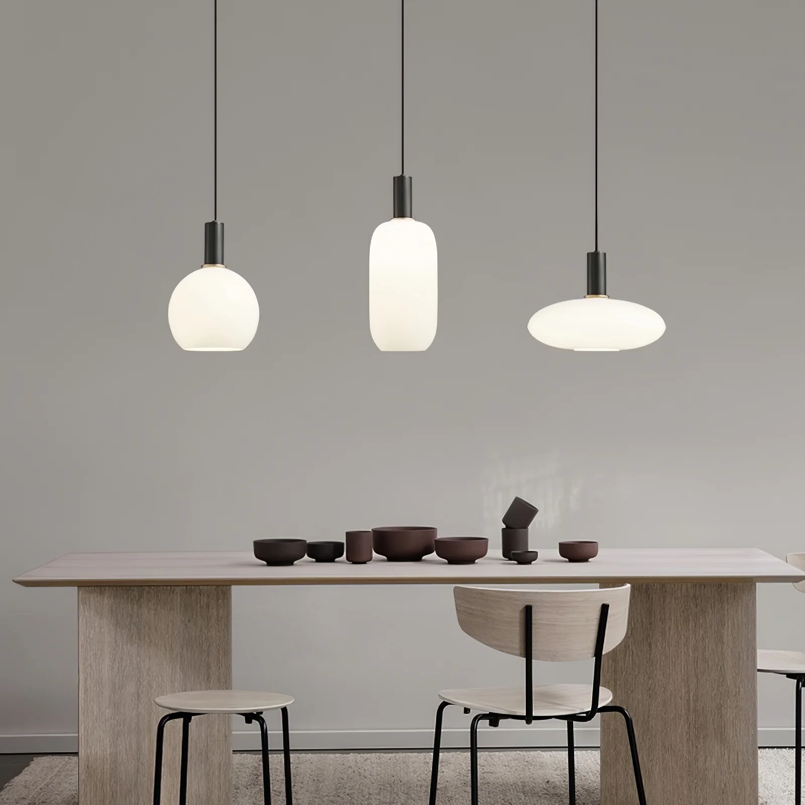 Minimalist pendant lights over dining table