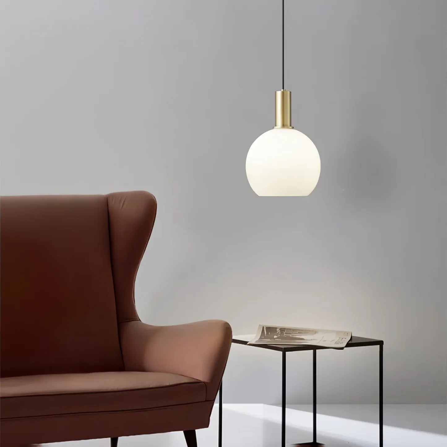Modern bedroom lighting with brass and glass pendant
