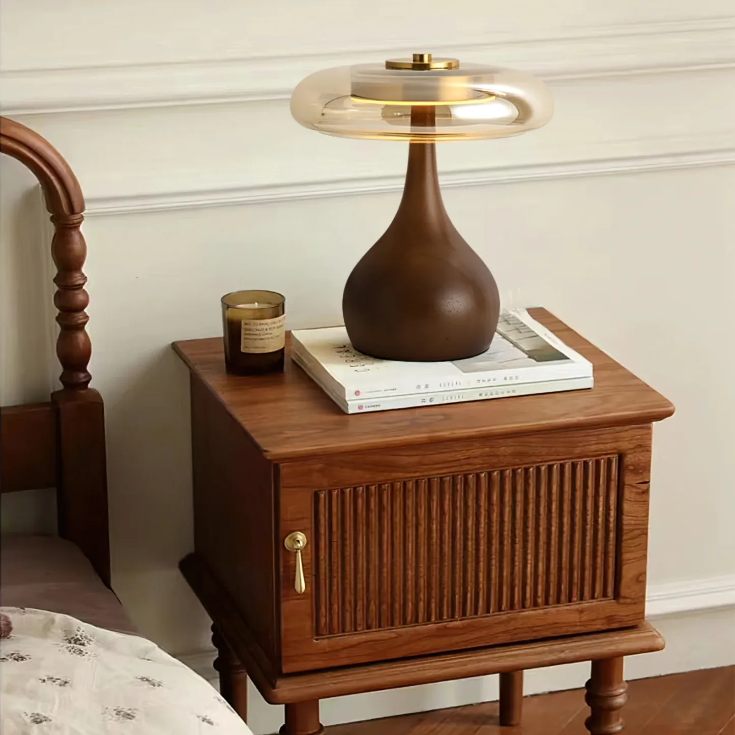 Bedroom nightstand with Ozawa table lamp and candle