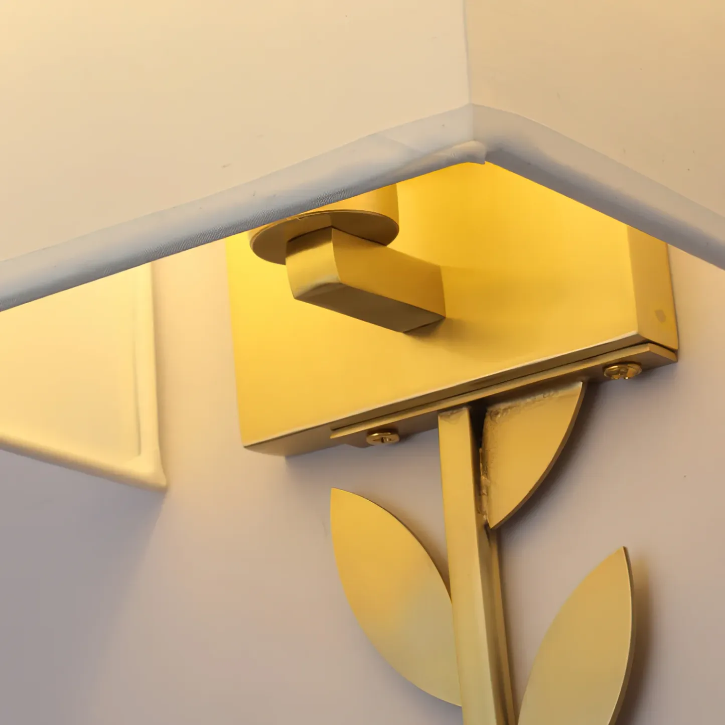 Brass leaf detail on Valentina wall lamp