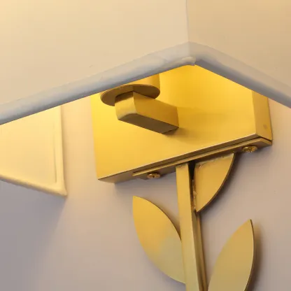 Brass leaf detail on Valentina wall lamp