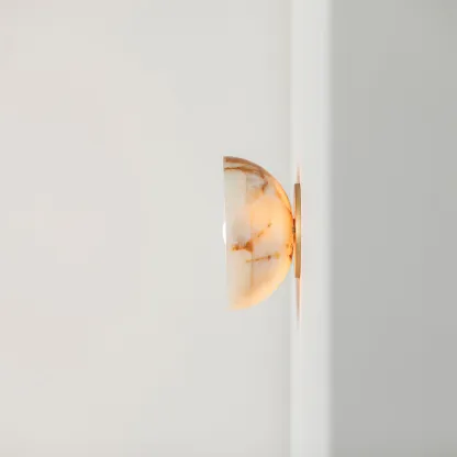 Elif Marble Wall Lamp, detail of the illuminated marble shade