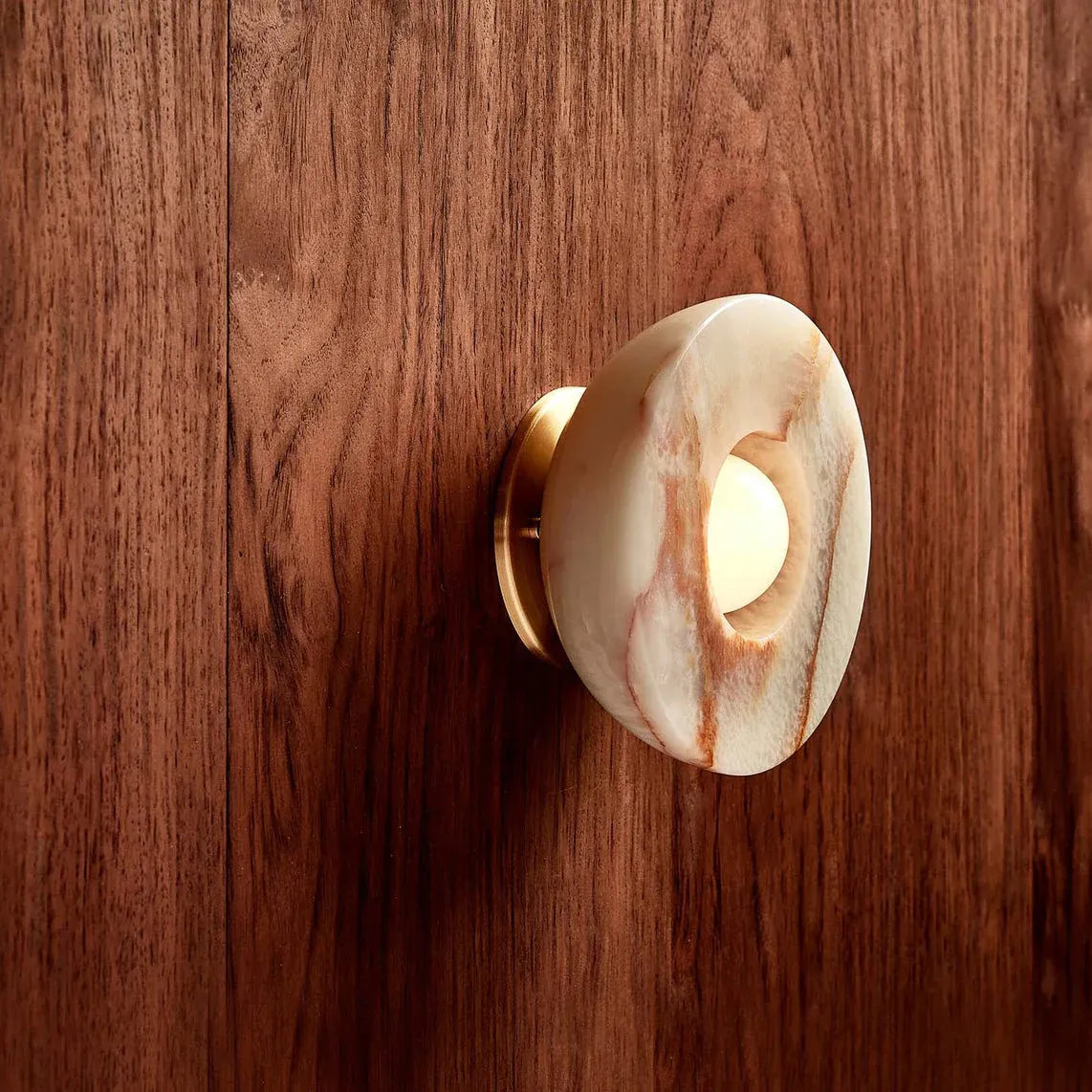 Elif Wall Lamp detail, marble shade and wooden wall