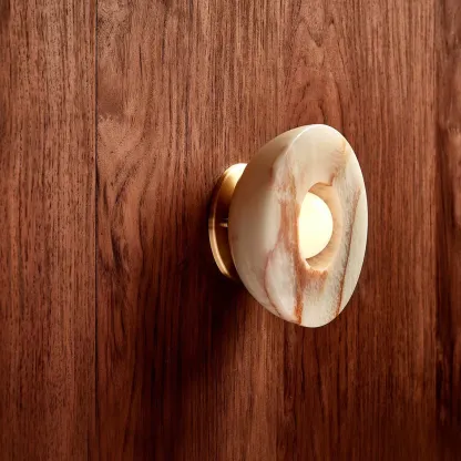 Elif Wall Lamp detail, marble shade and wooden wall