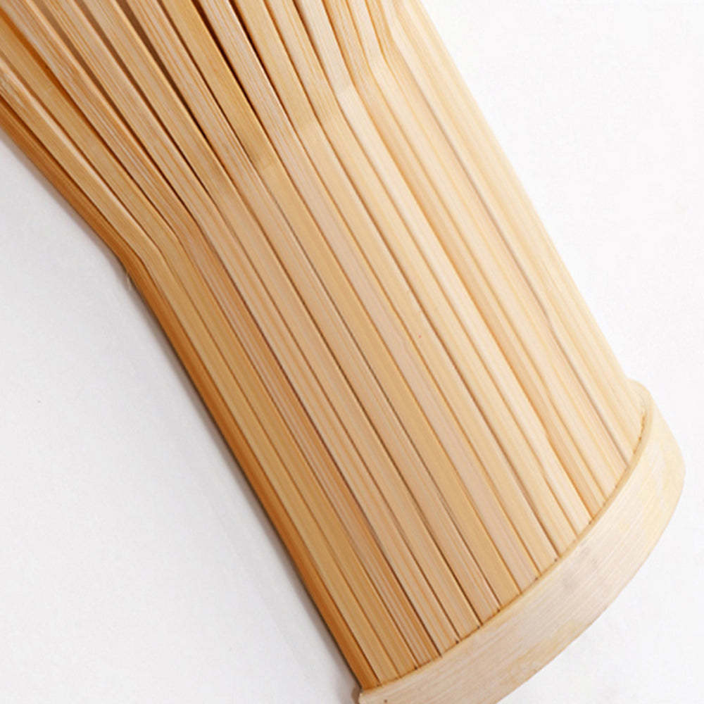 Close-up of Muto Rattan Wall Lamp's Bamboo Design