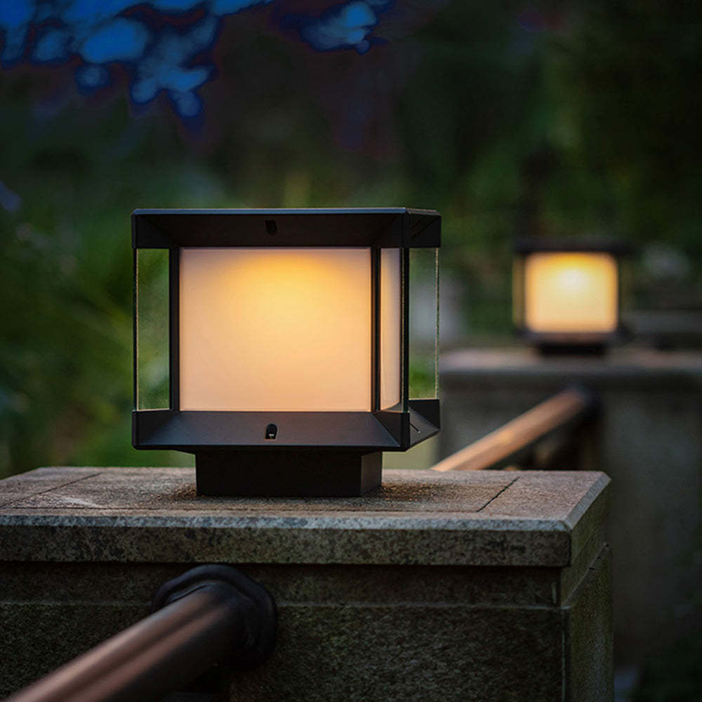 Riley Modern Outdoor Post Light glowing warm light