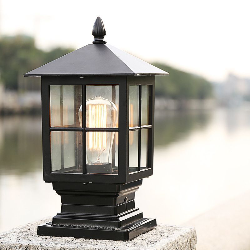 Alessio modern outdoor light post. Metal glass lantern.