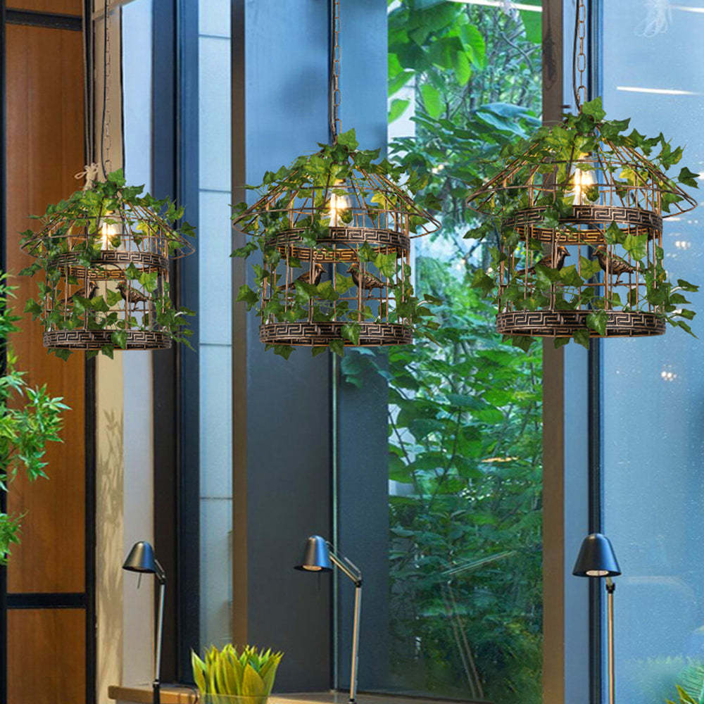 Vireo Birdcage Pendant Lights with green plant accents