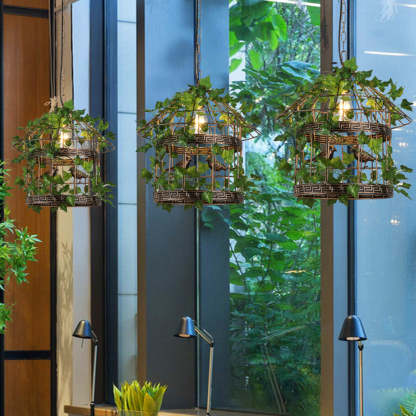 Vireo Birdcage Pendant Lights with green plant accents