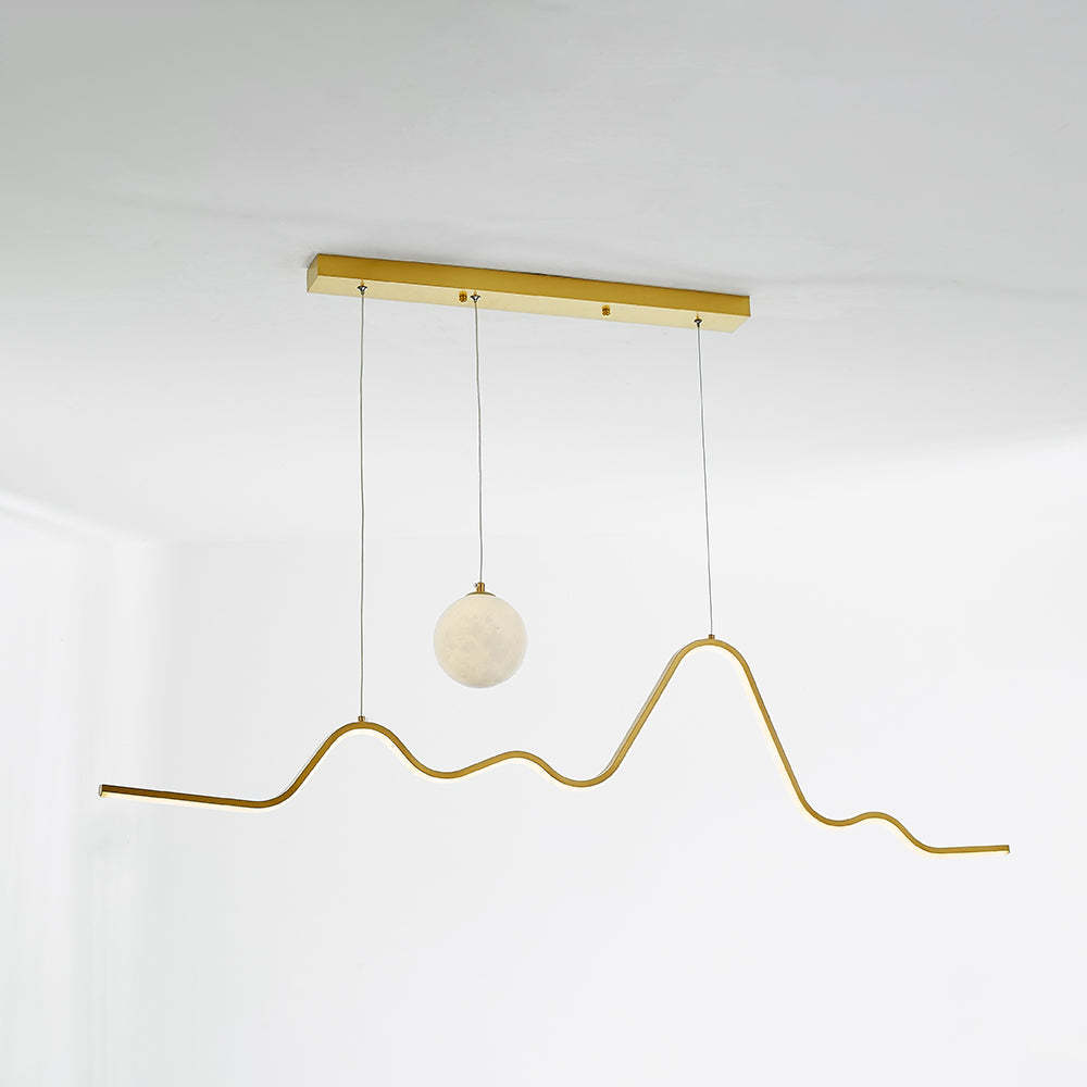 Gold wavy Louise pendant light. Modern minimalist lighting.