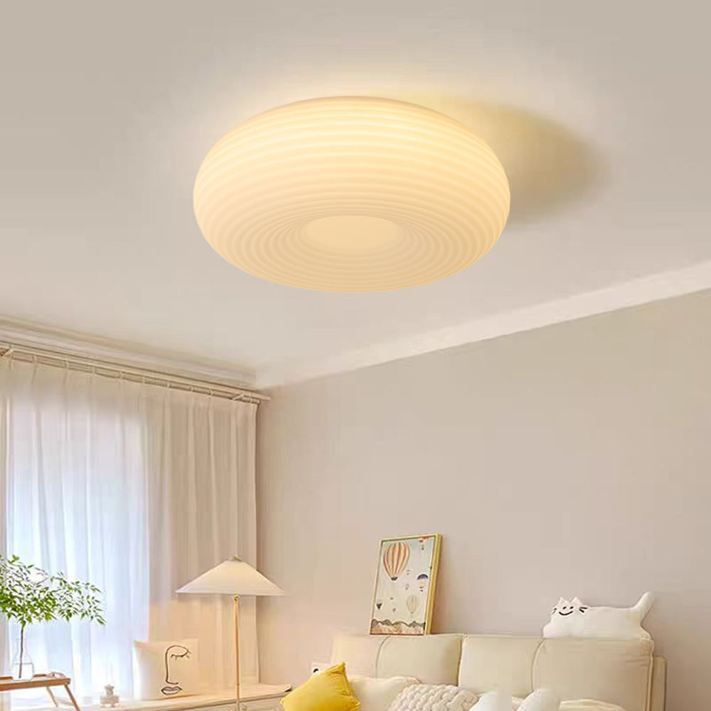 Quinn flush mount ceiling light in bedroom setting