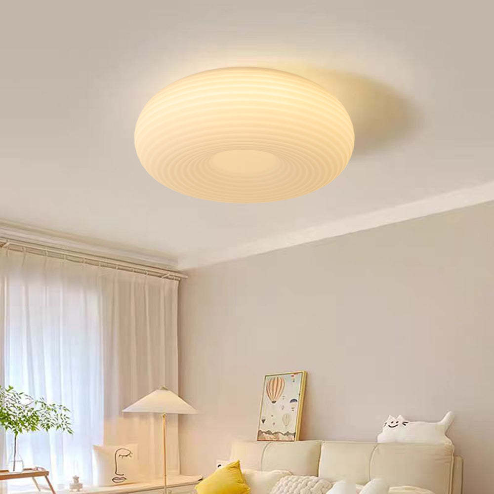Quinn flush mount ceiling light in bedroom setting