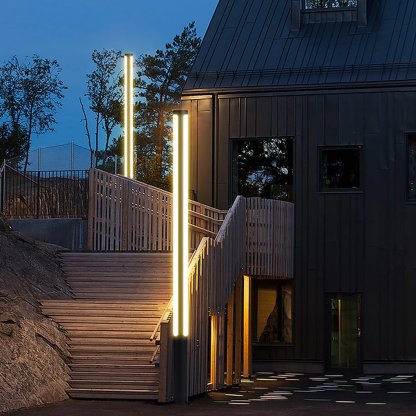 Outdoor pathway lighting with warm light illuminating staircase