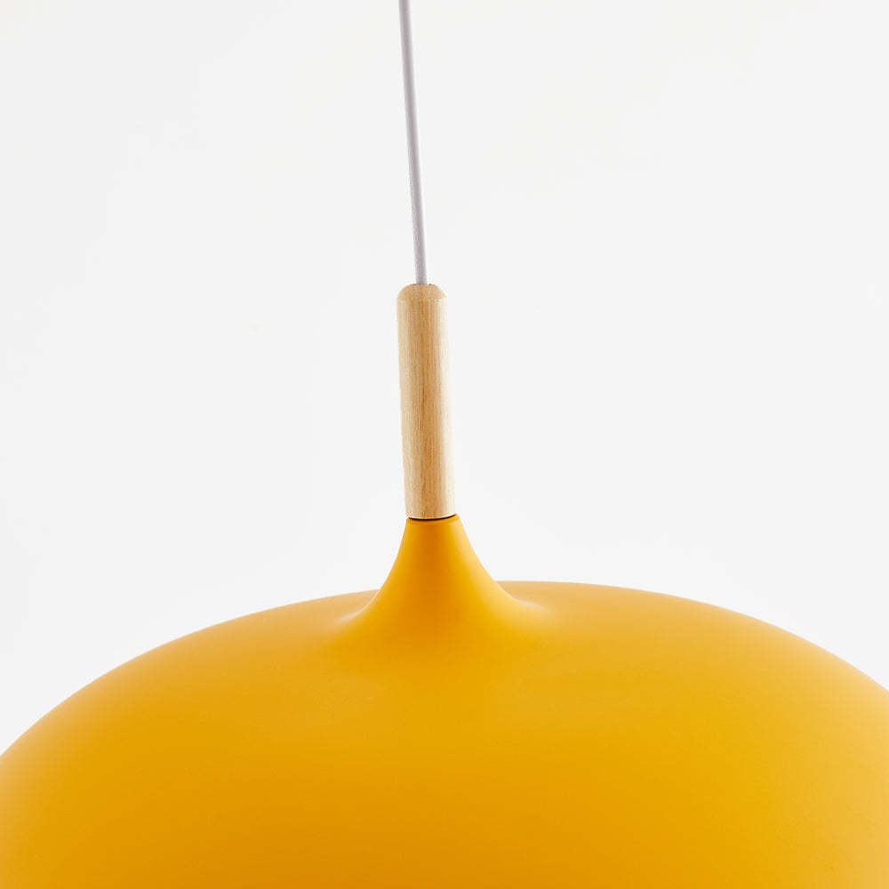 Yellow Leilani pendant light. Modern dome lighting for dining room.