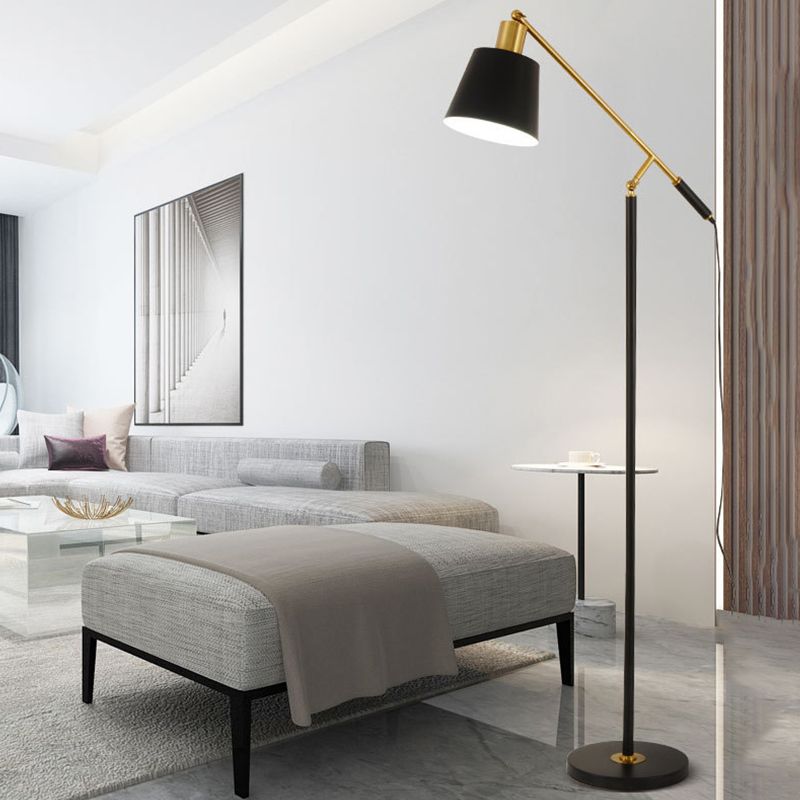 Modern black and gold floor lamp in living room