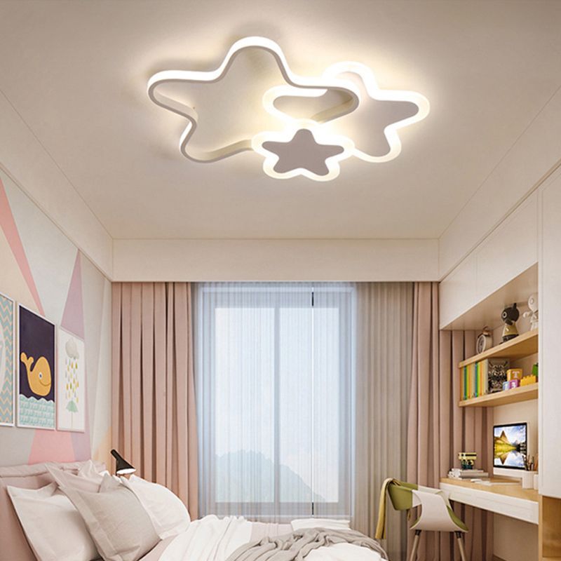 Star-shaped LED ceiling light in a child's bedroom