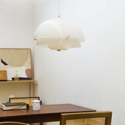 Hailie pendant light: modern white dome lamp over dining table.