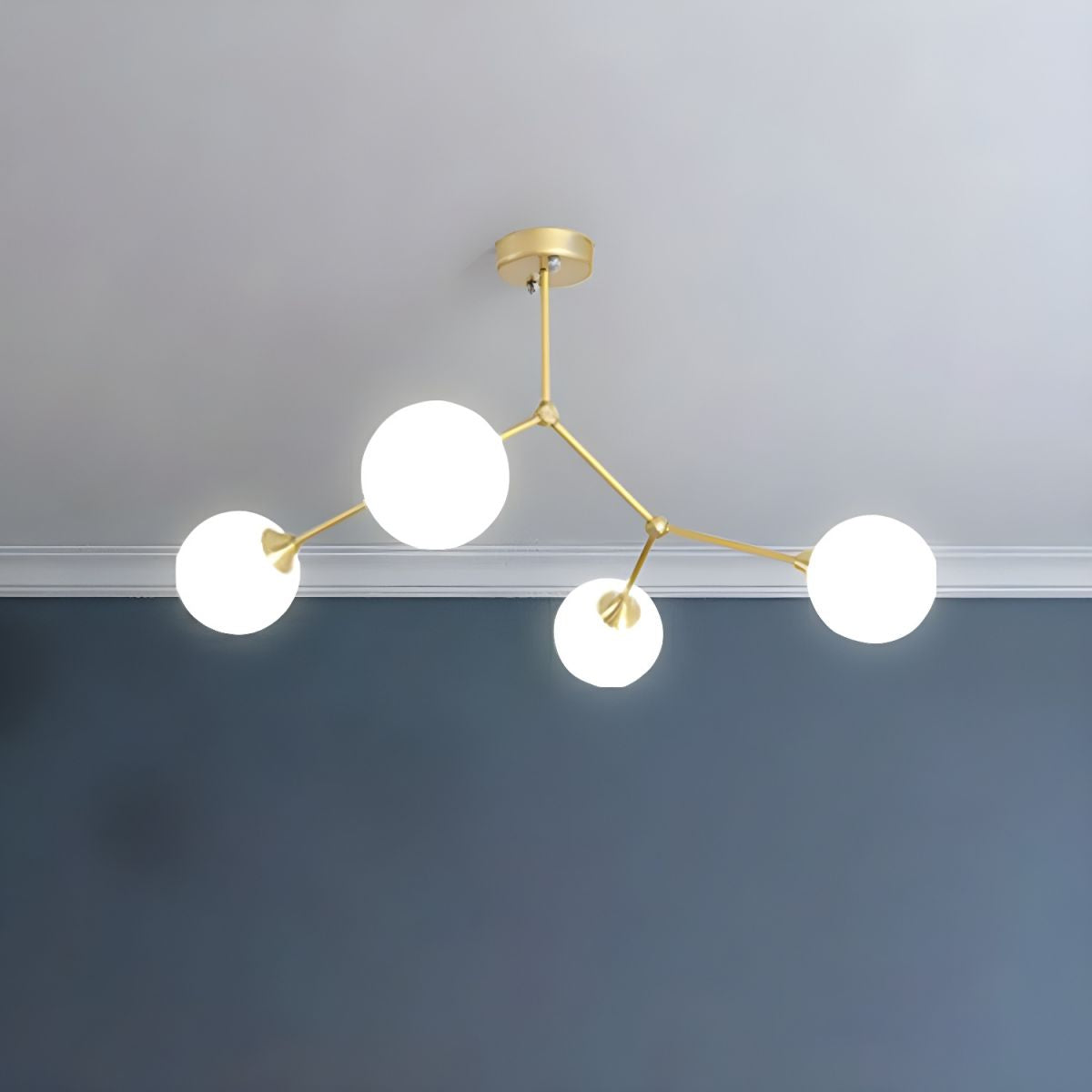 Modern gold chandelier with bubble glass shades