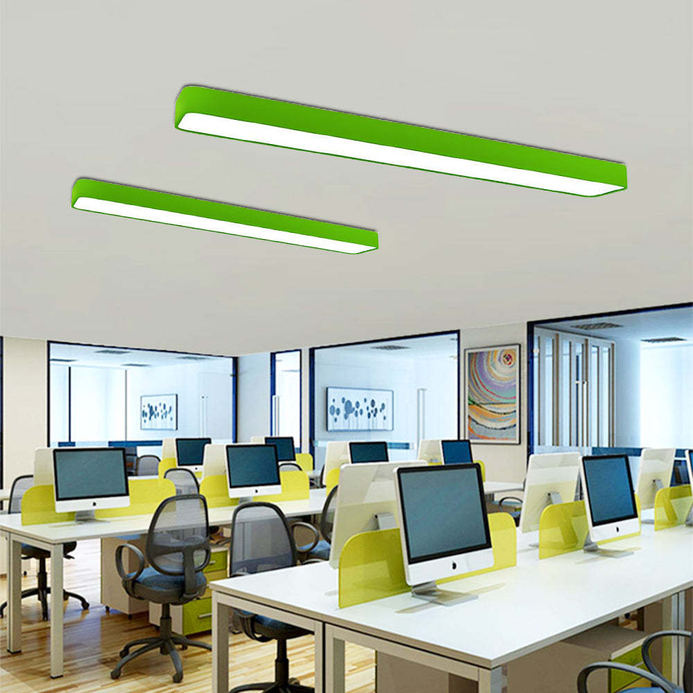 Green linear ceiling lights in modern office space