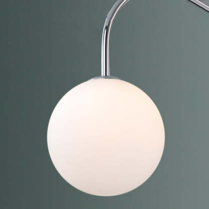 Chrome pendant light with white globe. Modern lighting by Las Sola.