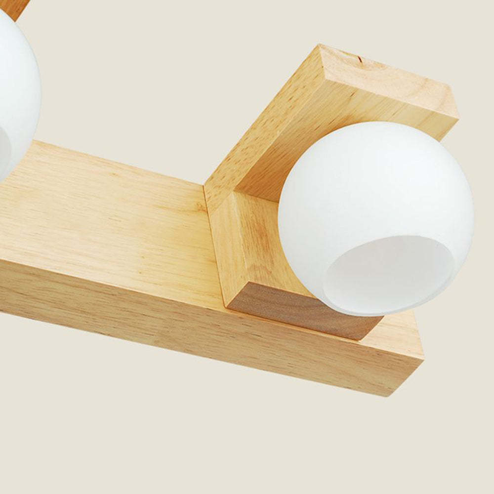 Wooden wall lamp close-up, glass globe lights