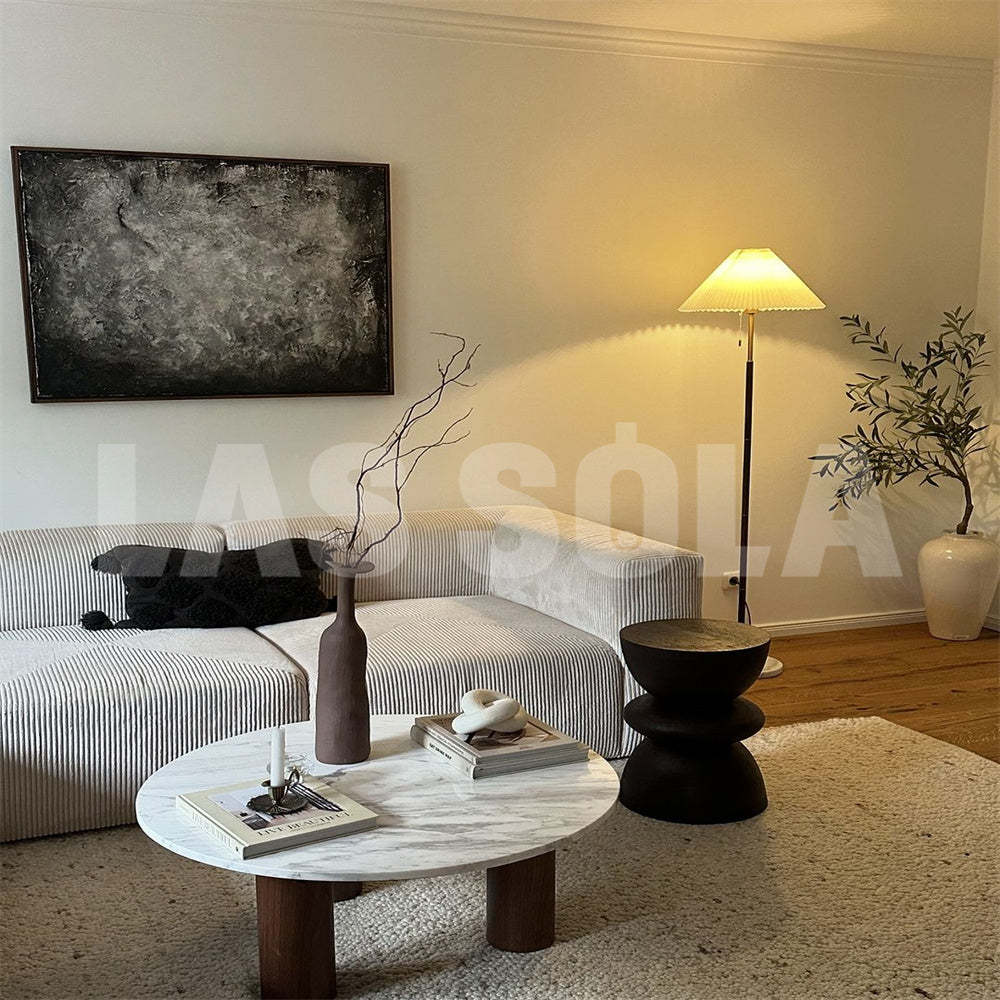 Modern living room with Ozawa floor lamp and pleated shade