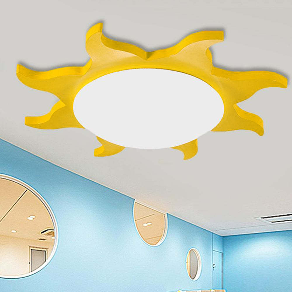 Yellow sun-shaped ceiling light fixture