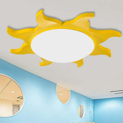 Yellow sun-shaped ceiling light fixture