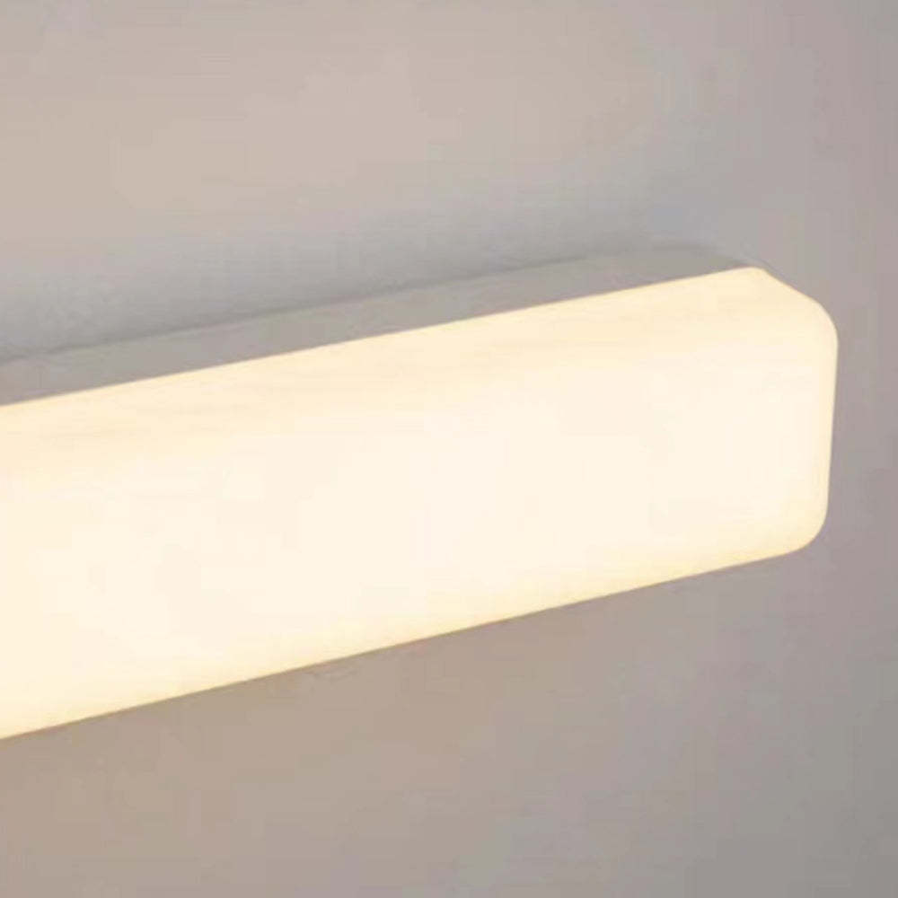 Edge Bar Wall Lamp close-up, warm LED light.