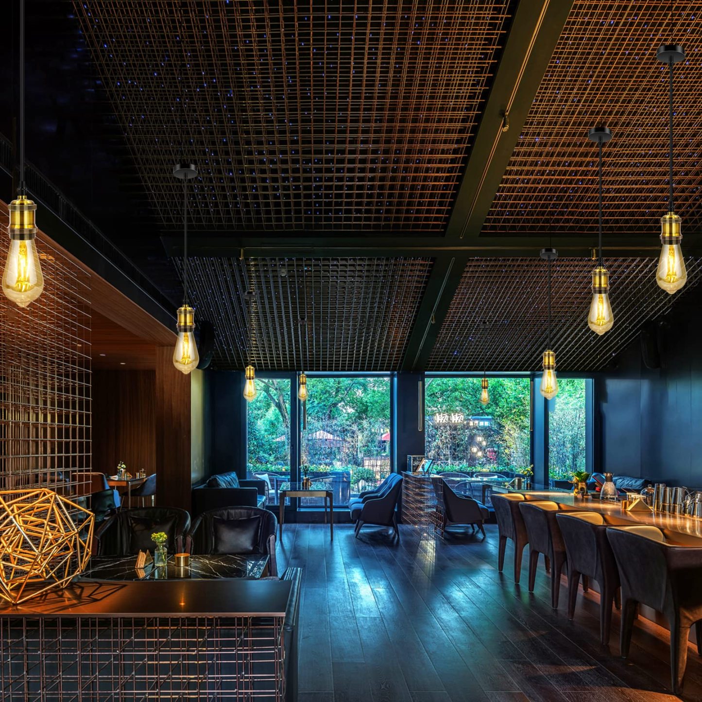 Alessio pendant lights illuminate modern restaurant.
