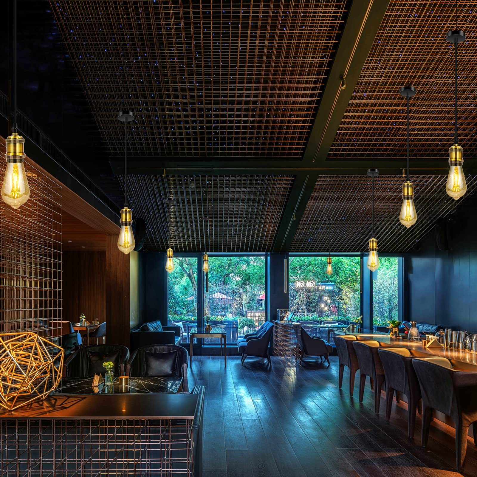 Alessio pendant lights illuminate modern restaurant.