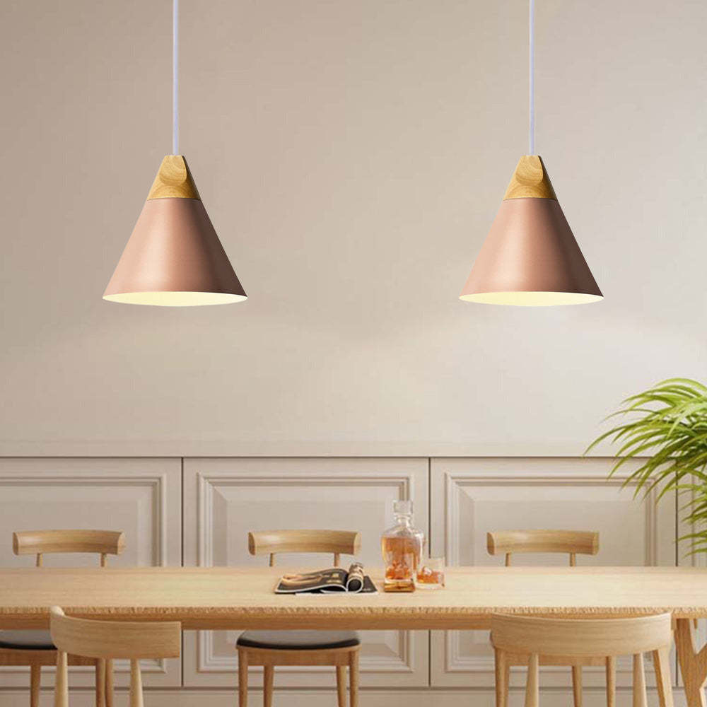 Pink Morandi pendant lights over a dining table, Lassola