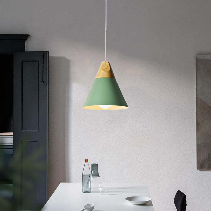 Green Morandi Pendant Light over a dining table, Lassola