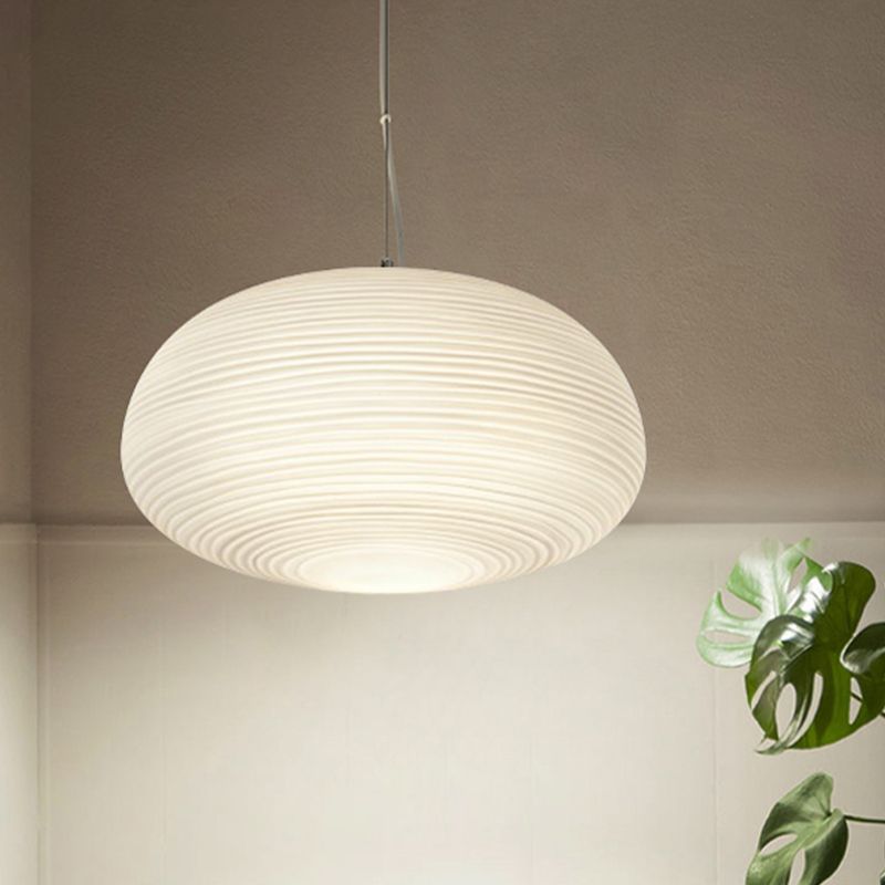 White pebble-shaped pendant light, Renée design, Lassola