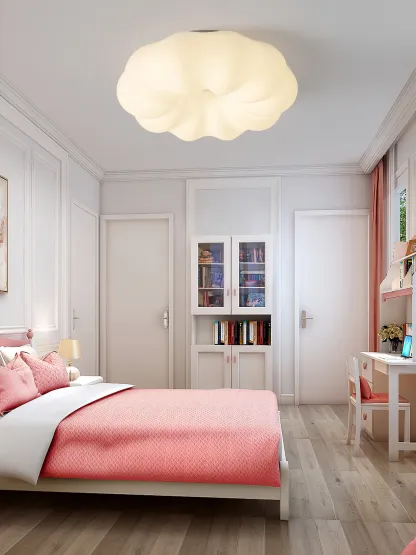 Quinn cloud ceiling lamp illuminating a bedroom