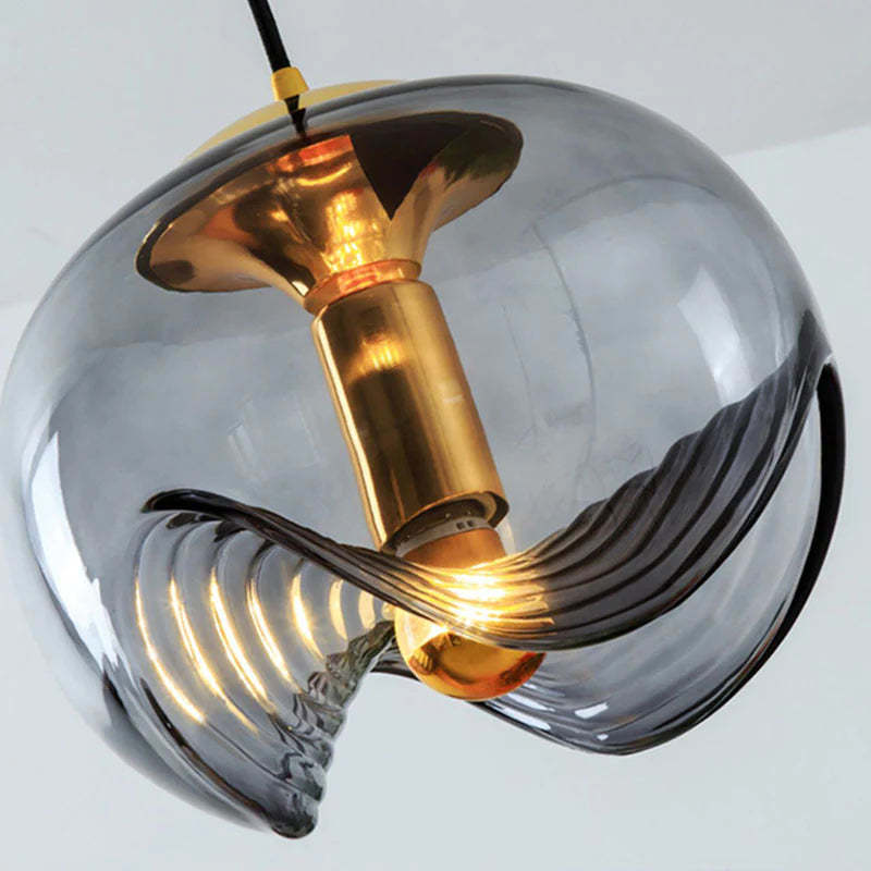 Smoked glass pendant light with gold accents
