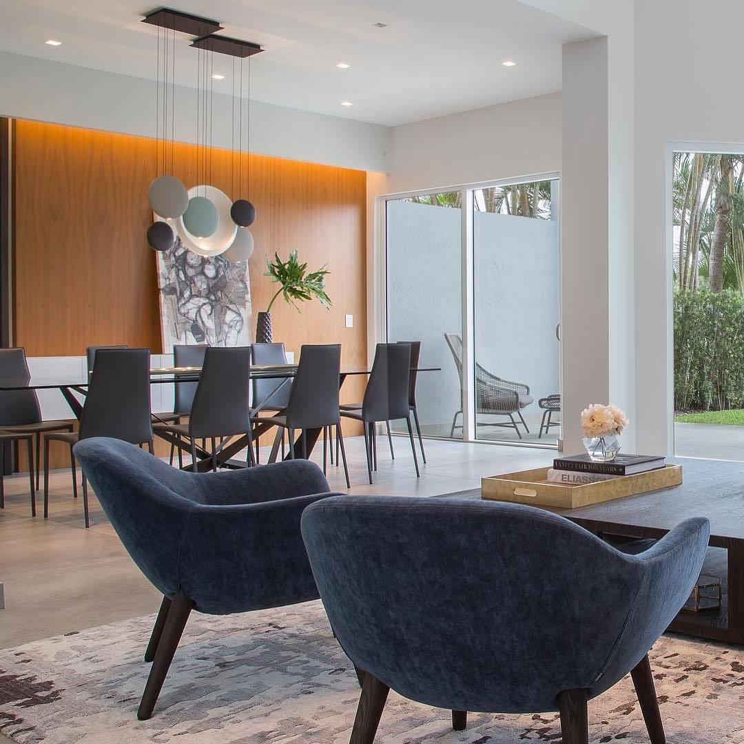 Zaid pendant lights illuminating a modern dining room