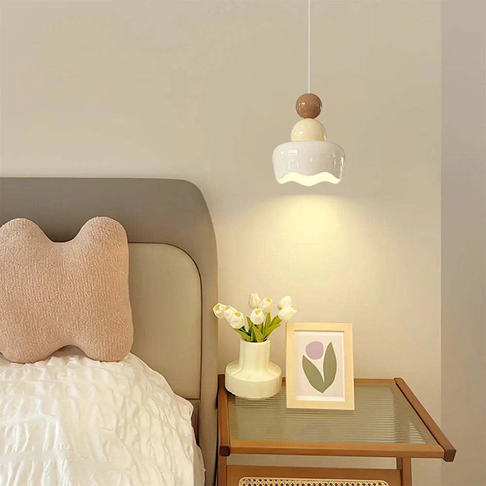 Morandi Rain Doll Pendant Light illuminating bedroom setting