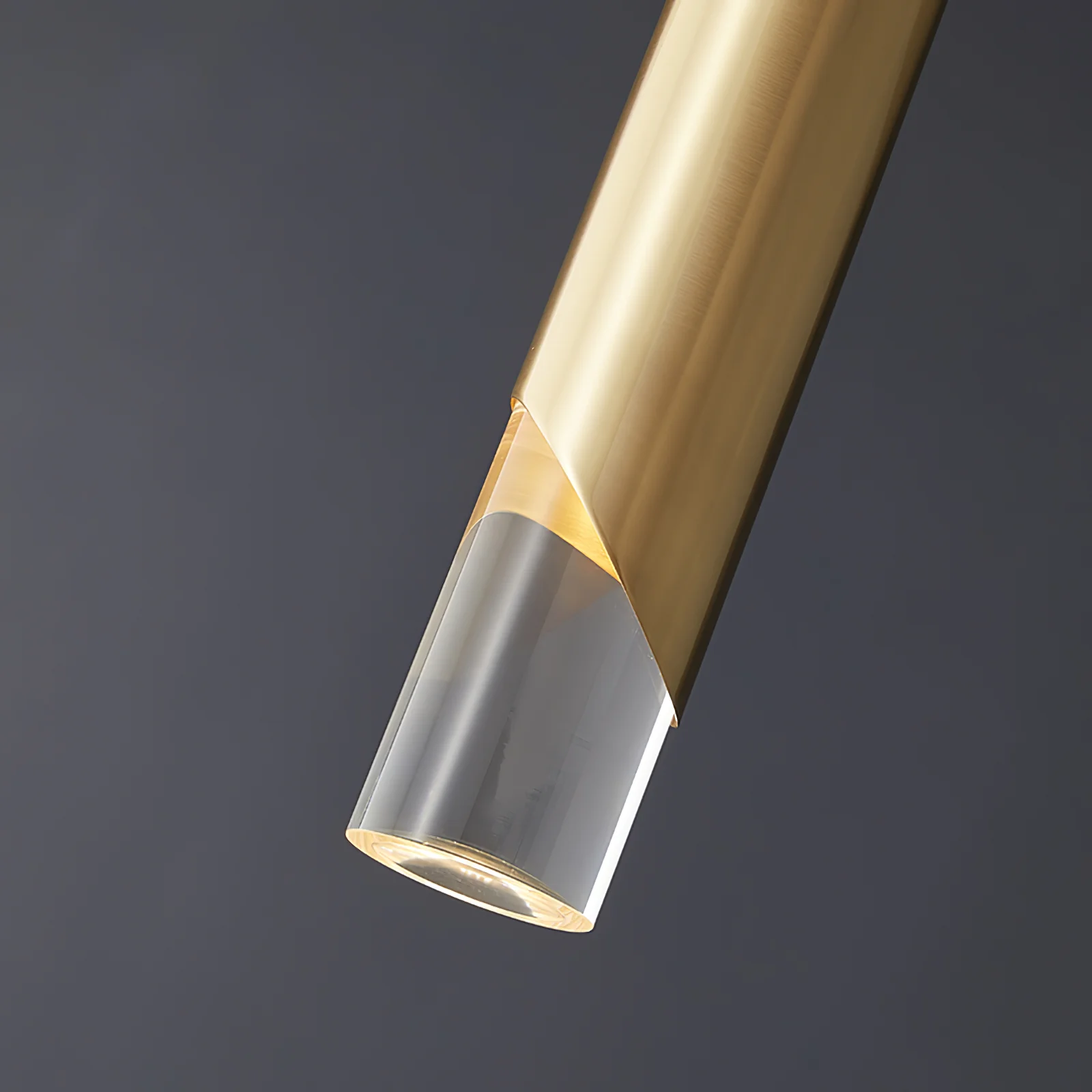 Modern pendant light detail, gold metal finish, acrylic shade