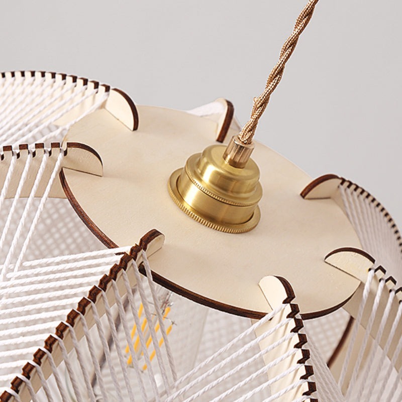 Close-up of Muto Retro Pendant Light's details: rope, wood, and brass elements