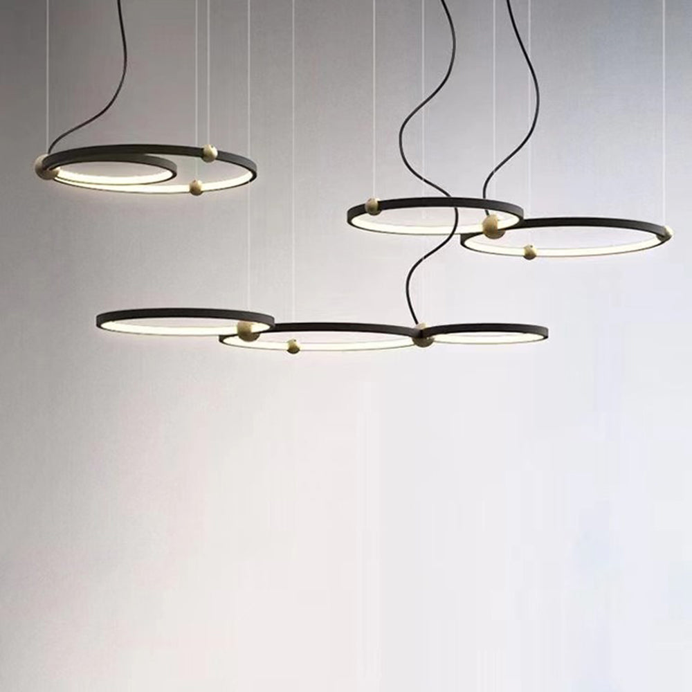 Arisha ring pendant lighting. Modern black and gold minimalist.