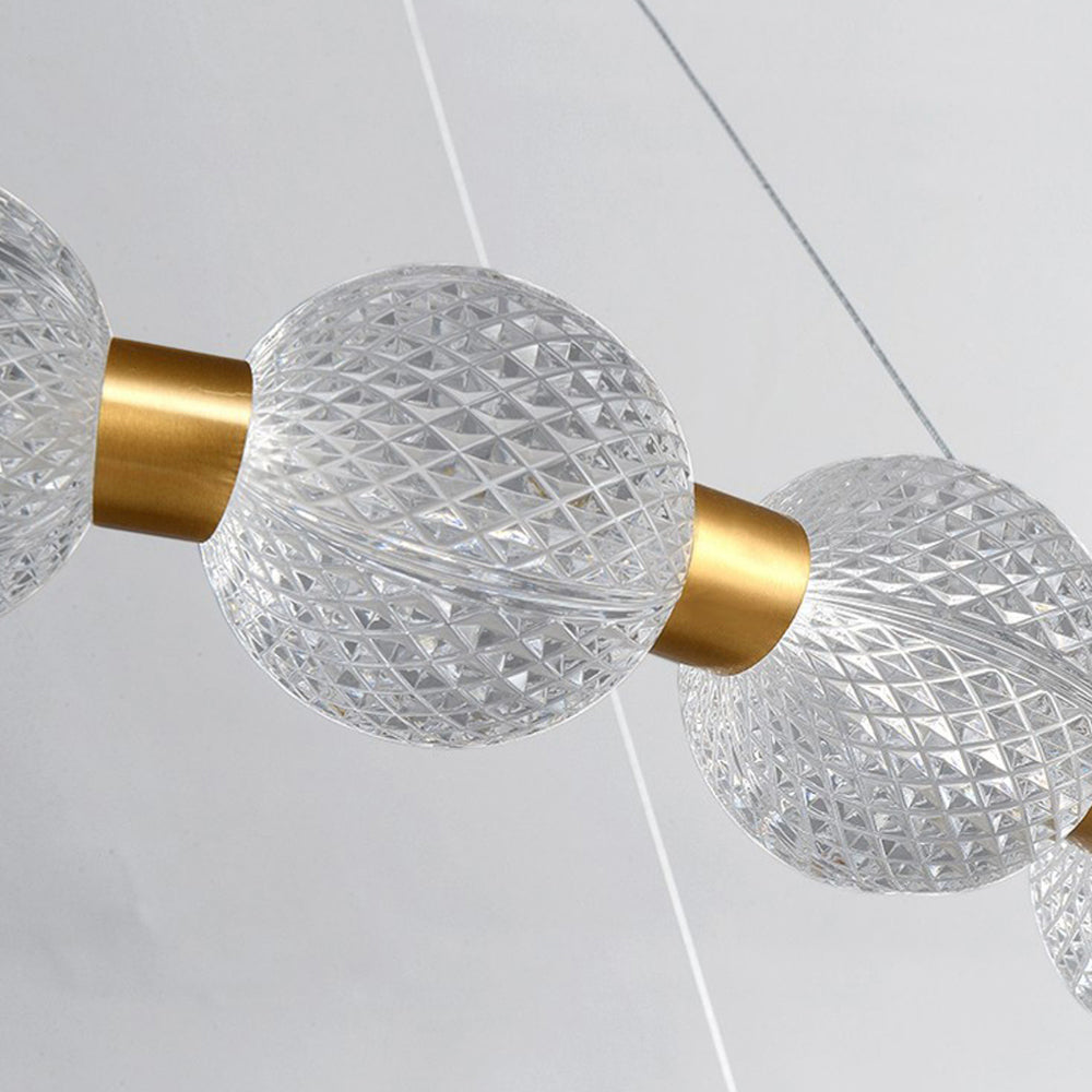 Acrylic Globe Pendant Lighting with Gold Fixtures